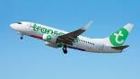 Transavia aircraft flying through sky