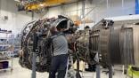 Technician works on CFM56-7B engine