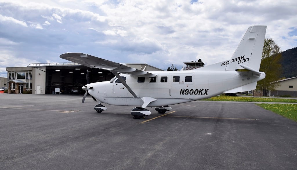 The Daher Kodiak repair station with plane in front